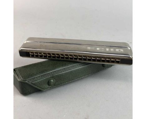 TWO HOHNER HARMONICAS, along with a Parrot harmonica (3)