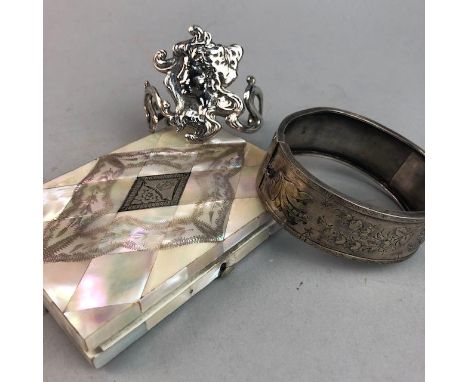 SILVER BANGLE, with Birmingham marks, along with a collection of costume jewellery including an Art Nouveau bangle, seed pear