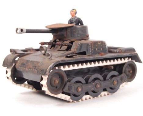 An incredibly rare pre-war Gama made tinplate clockwork German Panzer Tank . Rare black version (for Panzer). Tin plate const