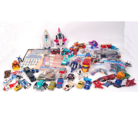 A superb large collection of vintage 1980's Hasbro ' Transformers ' action figures. Each unboxed, but many with accessories a