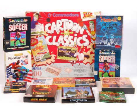 An original vintage Commodore Amiga 500 series computer games console. Appears complete within the original box, and original