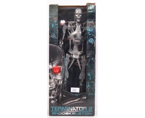 A fantastic NECA made Reel Toys ' Terminator 2 ' ' Endoskeleton ' 18" action figure ' With Light Up Eyes .' Contents appear u