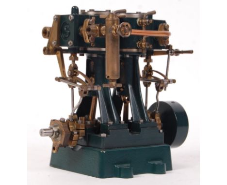 A rare Stuart twin cylinder vertical engine (possibly D10). Green painted, with brass and copper detailing. Working order. Ap