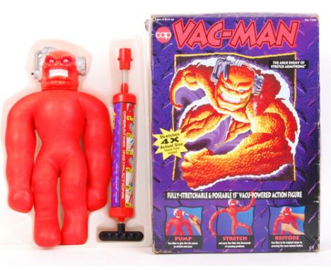 A fabulous 1990's Cap Toys made ' Vac-Man ' action figure. Similar to Stretch Armstrong, the figure appears mint, within the 