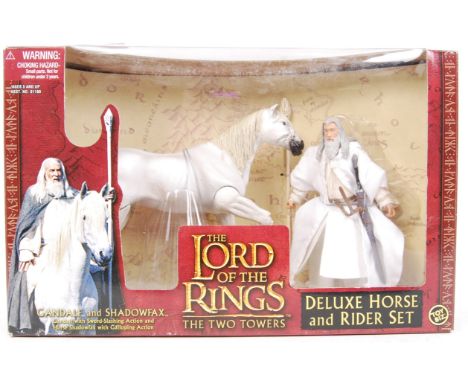 A Toy Biz made The Lord of the Rings; The Two Towers, ' Gandalf &amp; Shadowfax ' deluxe horse &amp; rider set. Mint &amp; fa