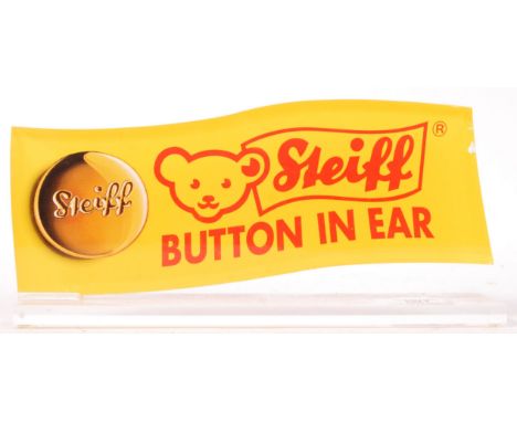 A rare contemporary Steiff teddy bears dealership / advertising display window plaque advertising ' Steiff - Button In Ear '.