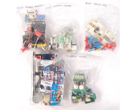 Five original vintage playmobil playsets comprising of; 3459 Operating Theatre, 3147 Racing Car, 3532 Safari, 3434 Petrol Sta