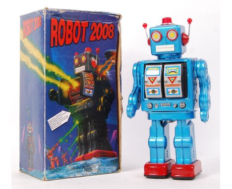 A fabulous vintage style Schylling ' Collectors Series ' tinplate battery operated ' Robot 2008 ' robot figure. Appears mint,