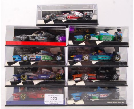 A collection of 9x Minichamps made 1:43 scale precision diecast model Formula One racing cars. All appear mint, unused, withi