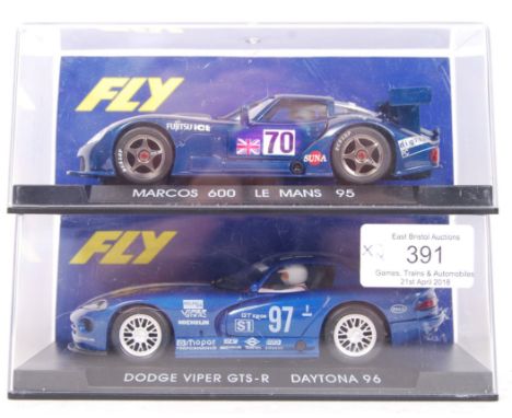 Two Fly 1:32 scale slot racing Sclaxtric style cars. Both appears unused, within the original display boxes. Comprising: Dodg