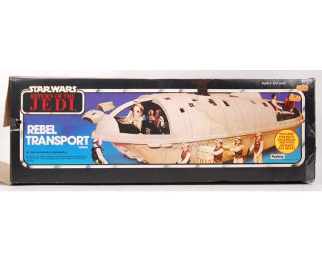 An original vintage Palitoy made Star Wars action figure playset vehicle ' Rebel Transport .' c1982. Vehicle appears largely 