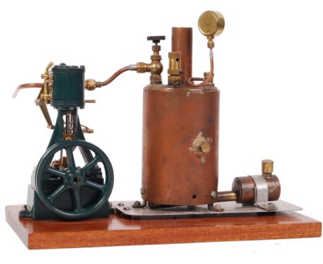A superb Stuart single cylinder vertical engine mounted to a steam plant, with boiler. Large copper boiler fitted with a Reev