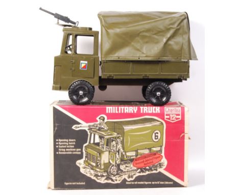 An original rare vintage Cherilea made Action Man ' Military Truck ' scale vehicle. Plastic, complete with all roof supports,