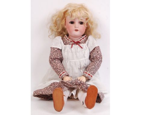 A good antique late 19th / early 20th century bisque headed Kammer &amp; Reinhardt doll. The rear of the head marked ' K &amp