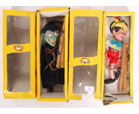 Two original vintage Pelham Puppet boxed puppets. To include; SL7 Pinocchio and SL10 Wicked Witch . Both appear within the or