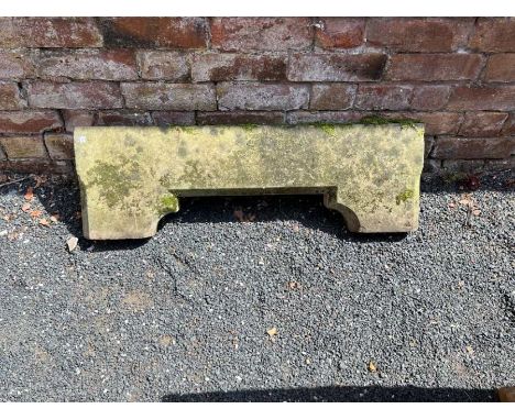 An architectural limestone block, partly canted,67cm high