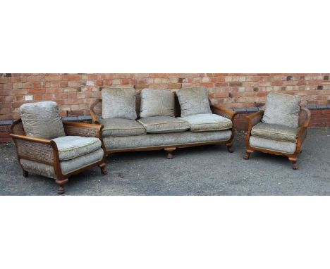 First quarter 20th century bergere three piece suite of typical form &amp; construction, 74cm high, very good condition throu