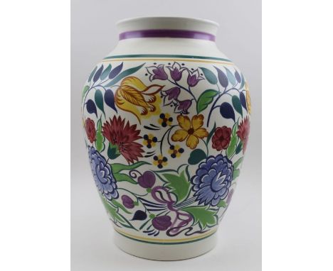 A 20th century Poole pottery vase of baluster form, traditional floral hand painted design in polychrome, factory backstamp t