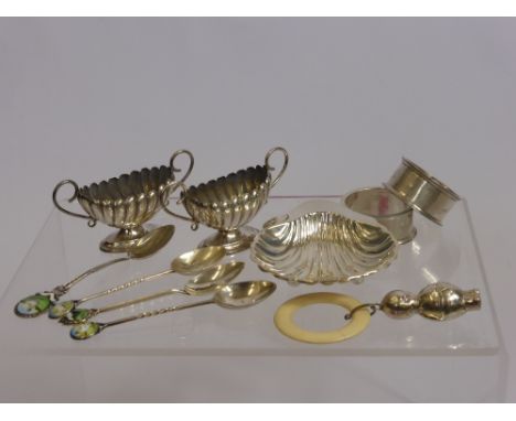 A Pair of Silver Salts, London hallmark, in the form of urns, together with a scallop form trinket dish, two silver napkin ri