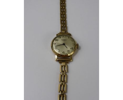 A Lady's 9ct Yellow Gold Rotary Watch on a 9ct Gold Bracelet. 