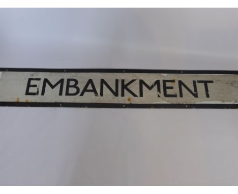 A London Underground Enamel Sign, depicting 'Embankment/Charing Cross'.