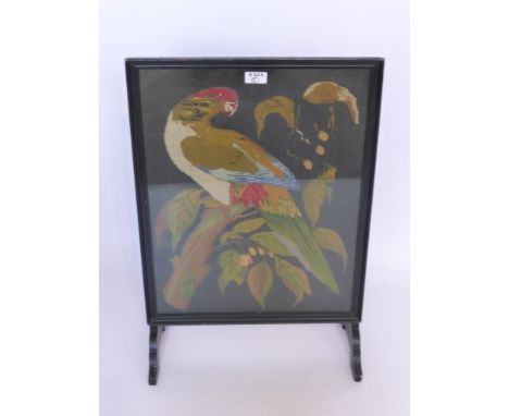 A Wool Tapestry depicting a Parrot, approx 41 x 55 cms, framed and glazed. 