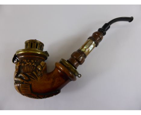 An Antique Meerschaum Pipe, the pipe having the bowl carved with a leaping rabbit, mother of pearl inlaid stem.