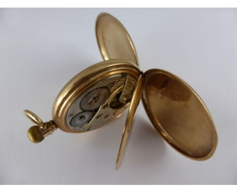 A Gentleman's 9 ct Gold Full Hunter Pocket Watch by Stayte, the watch having white enamel face with baton numerals. The case 