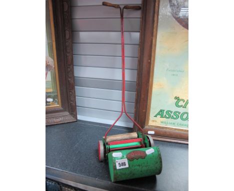 A Mid XX Century Large Scale Toy Lawnmower, by Codeg.