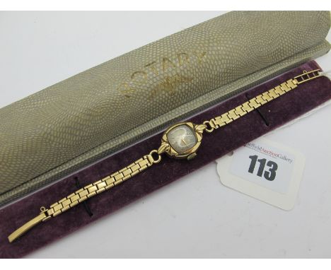 Rotary; A 9ct Gold Cased Ladies Wristwatch, the cushion shape dial within shaped case, to later bracelet with 9ct gold clasp,