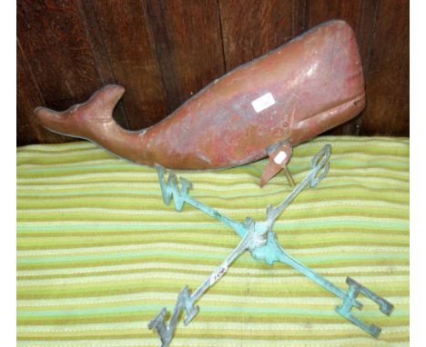 A COPPER WEATHER VANE in the form of a whale, 64cm wide