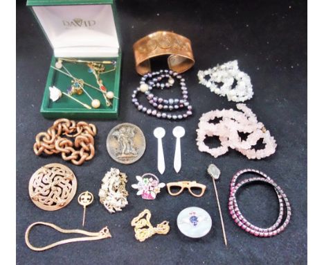 A COLLECTION OF JEWELLERY, to include a copper torque bangle 