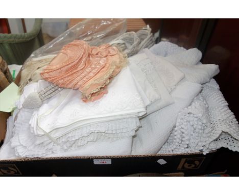 A VICTORIAN BED COVER, a collection of Vintage textiles and a bolt of voile material