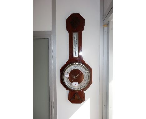 A 1930S WALNUT BANJO BAROMETER by Walker & Hall