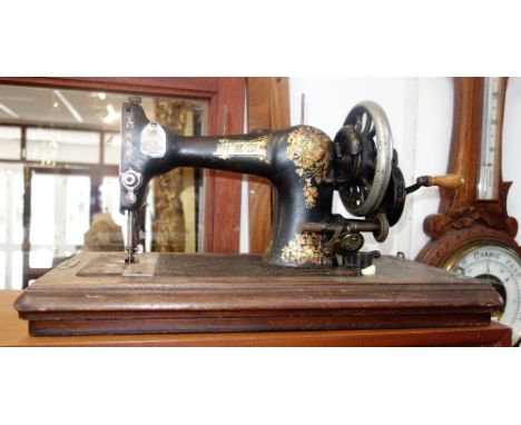 A VICTORIAN OAK "BANJO" BAROMETER, a sewing machine, a stool  two mirrors and a tray