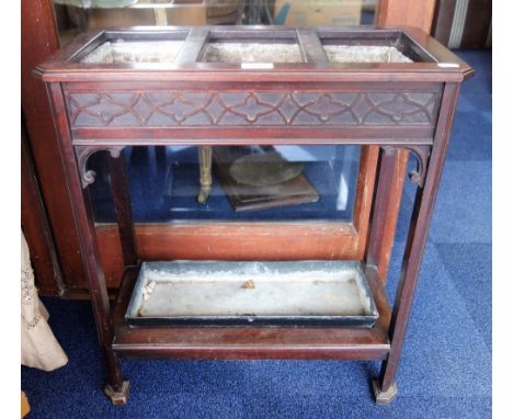 AN EDWARDIAN MAHOGANY CHIPPENDALE REVIVAL UMBRELLA/STICK STAND, with blind fret frieze and canted corners (converted to a jar