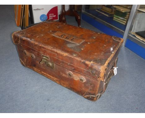 A VICTORIAN LEATHER TRUNK  with the initials "CGL" and stamped "Solid leather"