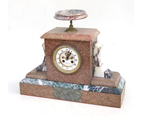 A late 19th century French marble mantle clock with open escapement, the white enamel dial with Roman numerals, 44cms (17.25i