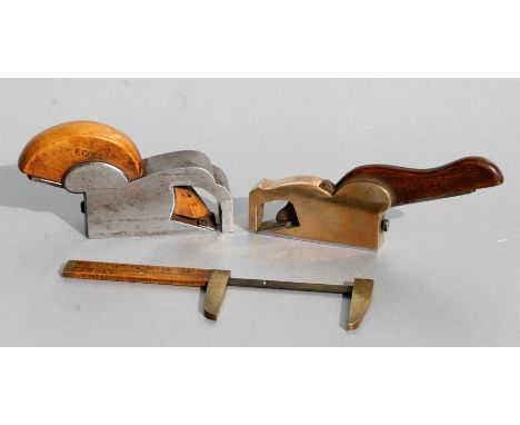 A Victorian brass and mahogany shaving plane; together with other woodworking tools.