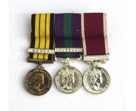 A mounted miniature medal group consisting of the Africa General Service Medal with Kenya clasp, a GSM with Cyprus clasp and 