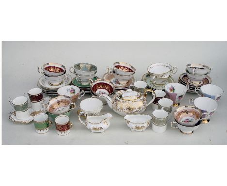 A quantity of assorted Paragon and Limoges tea and coffee wares to include coffee cans and cabinet plates.Condition ReportGoo