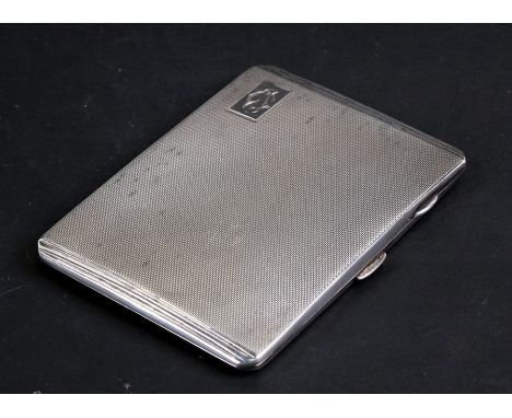 A silver cigarette case with engine turned decoration, Birmingham 1941, weight 146g, 11cms (4.3ins) wide.