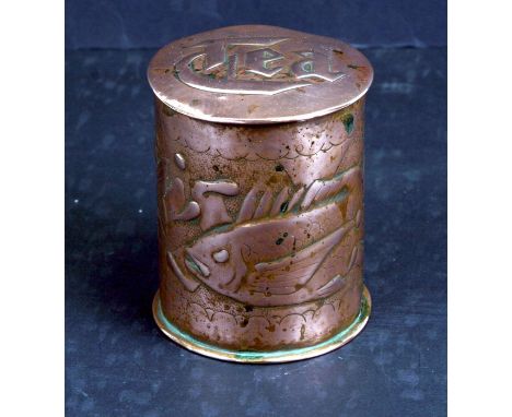 A late 19th / early 20th century Newlyn Arts &amp; Crafts copper tea caddy, the sides with repousse decoration of fish, stamp