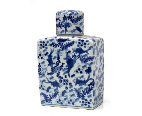 A Chinese blue &amp; white caddy decorated with fish, 24cms (9.5ins) high; together with another similar, 16cms (6.25ins) hig