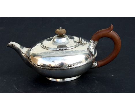 A Matthew Bolton silver plated teapot of compressed globular form with two sun mark to the underside, 11cms (4.25ins) high.Co
