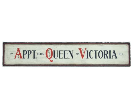 A large painted antique style plaque 'By Appointment to HM Queen Victoria', 170cms (67ins) wide.