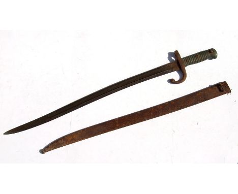 A 19th century French bayonet and scabbard, 71cms (28ins) long.Condition Reportpoor condition overall scabbard, hilt and hand