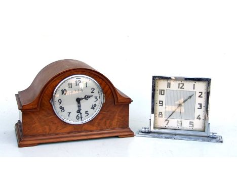 A walnut cased mantle clock with Westminster chimes; together with an Art Deco chrome mantle clock (2).
