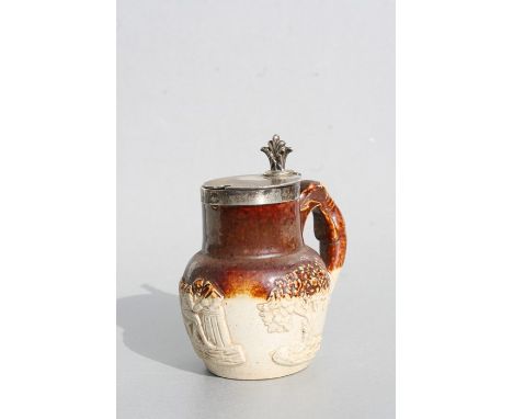 A George III salt glazed stoneware preserves pot with silver cover and matching spoon, London 1822, 9cms (3.5ins) high.