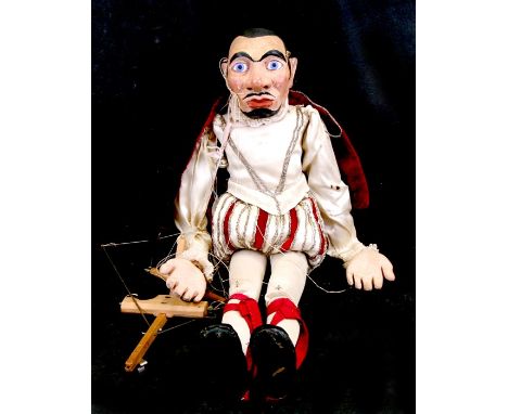 A vintage hand made marionette puppet in the form of an Italian or Venetian gentleman wearing a velvet cloak, 53cms (21ins) h